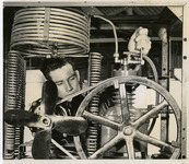 Man adjusting equipment