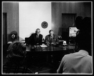 President Philip G. Hoffman with Mr. Conrad N. Hilton during a press conference