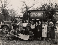 Walter W. Kemmerer with a group in front of a Parker Bros. ready mixed concrete truck