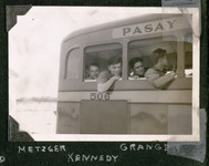 Alvin M. Metzger, Charles H. Granger, and Albert E. Kennedy on a bus