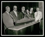 Model presentation, USS Houston (CA-30), from 3rd from right, Elisabeth Holcombe Crosswell, A.D. Simpson, William A. Bernrieder