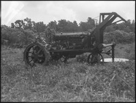 Side view of a tractor in a field
