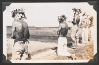 A line of flagellants kneeling and standing