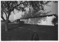 Exterior of the KUHT building with sign