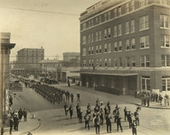 Firefighters marching in parade at funeral of Captain George Bishop