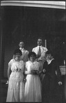 Group photo standing on front steps