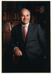 Kenneth L. Lay formal protrait in front of books