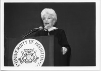 Ann Richards standing at a University of Houston podium