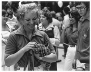 Shasta V being held by a woman