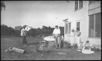 Group of people cooking outdoors