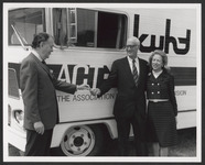 P.J. Nicholson accepts the KUHT remote truck from Frank Wozencraft and Marty Levine