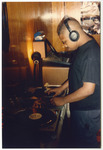 DJ Screw on the mixer and turntables