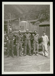 Five men at POW camp, with Henry Thew (second from right)