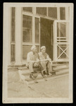 Crew members at back of barracks