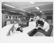 Two men working inside the Computing Center