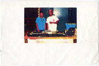 DJ Screw and DJ Chill behind the turntables