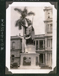 T. L. Sitton posing with the King Kamehameha statue