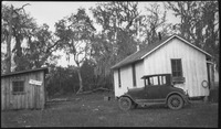 Shack, small house, and automobile