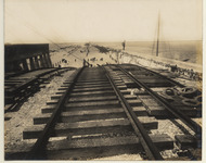 Causeway tracks from north of arched bridge to mainland