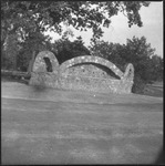 Stone structure on a grass lawn