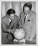 Henry Lanner and John Schwarzwalder explore a model globe