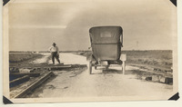 Man observing steam road tracks between Texas City and La Marque