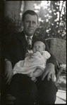 Man with a baby in his lap