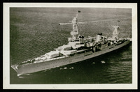 USS Houston (CA-30), flying the flags of President Franklin D. Roosevelt and Admiral W.D. Leahy, taken from the air