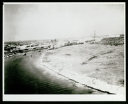 USS Houston (CA-30) in Houston Ship Channel, approaching turning basin, taken from the air