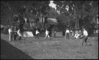 Group of people playing baseball