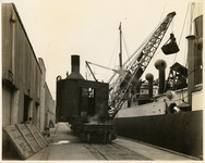 Crane next to a ship
