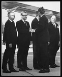 President Philip G. Hoffman shaking hands with President Kennedy at a Houston airport