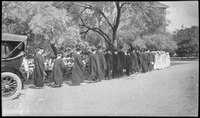 Line of young people at a commencement ceremony