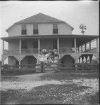 Group of people sitting on porch steps