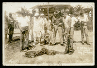 Men with boa constrictor