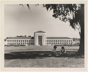 Two women by the Ezekiel Cullen Building