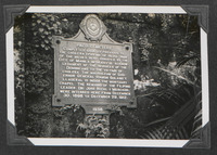 A historical marker about Paco Cemetery