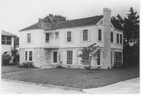 Side view of house showing the chimney and windows