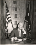 A. D. Bruce at his desk