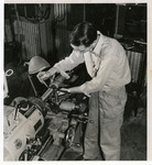Man working on a lathe