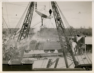 Vehicle being loaded onto ship