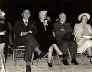 Hugh Roy and Lilie Cranz Cullen sitting in an audience