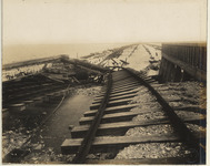 Causeway wreckage from arched bridge toward the island