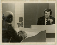 Man speaks on "On the Line" television show