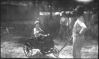 Child being pulled in a wagon