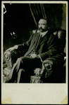 Francisco I. Madero sitting on a chair