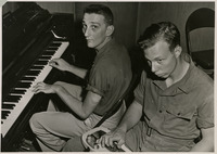 Charlie Whilaker and Harold Mayfield play music