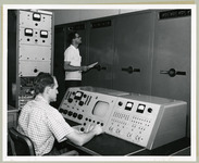 Arvil Cochran and Bill Davis monitor the KUHT control room