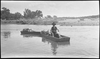 Elderly man in small boat