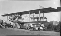 Group of people standing on NC-4 aircraft